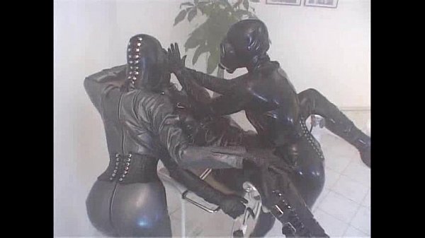 Rubber strapon brunette anal fuck