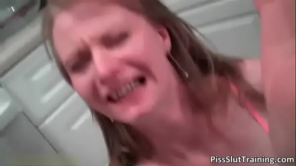 Brunette slut pees in shower bondage
