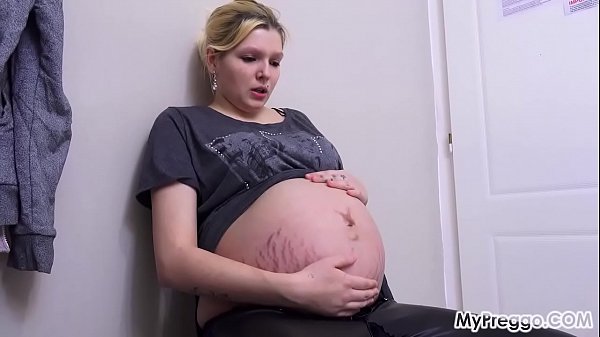 Pregnant woman having strong contractions at 38 weeks
