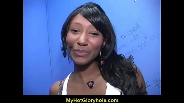 Ebony girl sucks cock at gloryhole