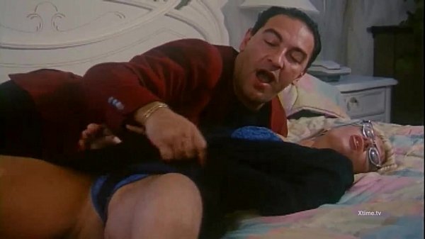 Sarah Louise Young and Roberto Malone in a vintage hardcore mm handjob scene from the cult classic A Family For Penis full movie.