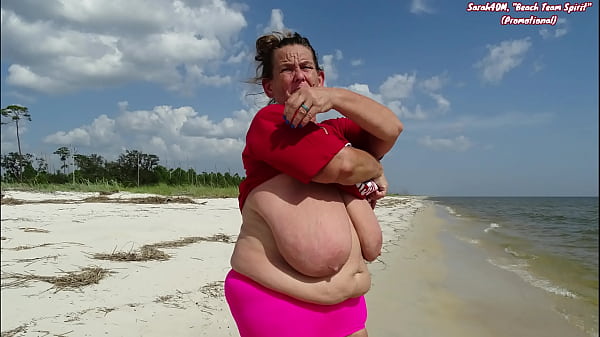 Curvy mature Sarah40M big tits jiggle on beach