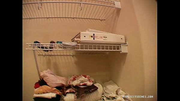 Brunette girl masturbates with sex toys in closet