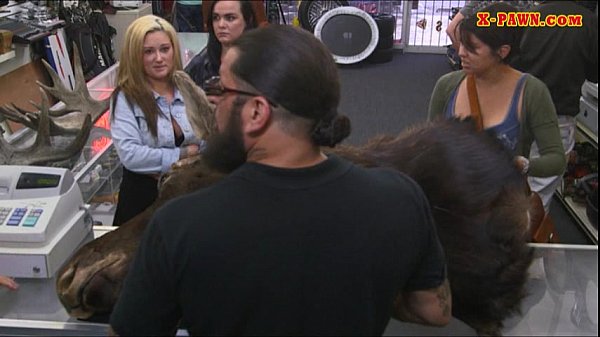 Blonde amateur caught making out with lesbian in pawnshop then gets a blowjob