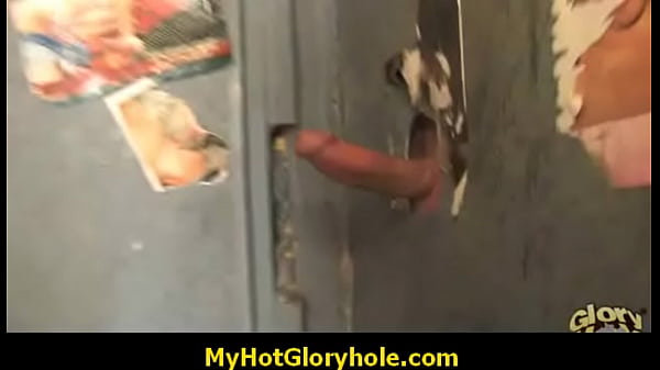Black woman sucks big cock through gloryhole