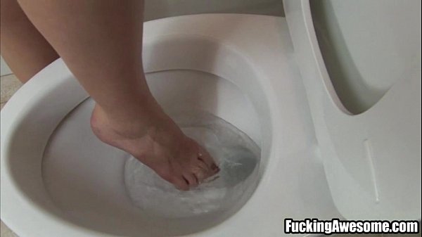 Busty blonde gives deepthroat blowjob in toilet