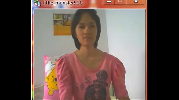 thai student on webcam videochatting with girlfriend