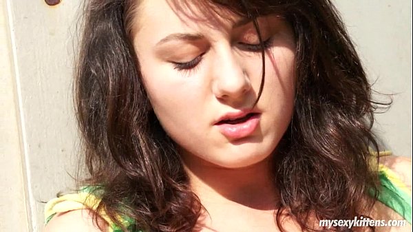 Teen brunette Lucy masturbates outside